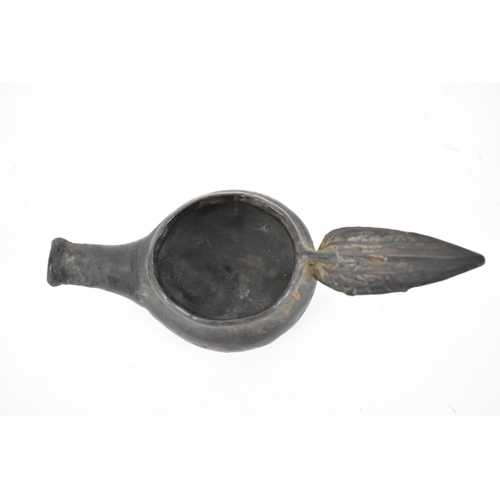 68 - An antique patinated bronze oil burner lamp
Condition: small crack to handle
Location: 10.3