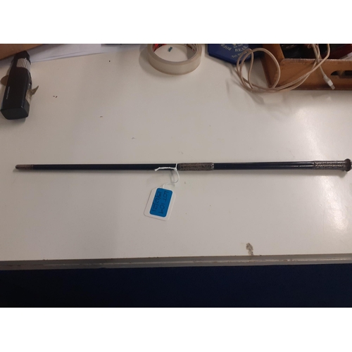 79 - A Late 19th/early 20th Century ebony conductor's baton with Sterling silver worked handle, tip and c... 