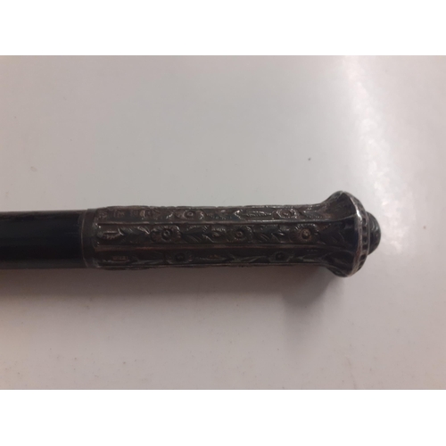 79 - A Late 19th/early 20th Century ebony conductor's baton with Sterling silver worked handle, tip and c... 