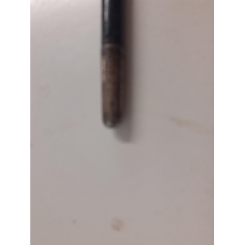 79 - A Late 19th/early 20th Century ebony conductor's baton with Sterling silver worked handle, tip and c... 