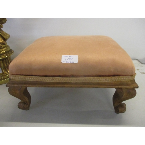 108 - A brass coloured table lamp in the form of an eagle with outstretched wings, perched on a rocky base... 