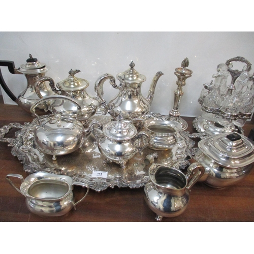 115 - A selection of silver plate to include an ornate twin handled tray, coffee/tea services, candlestick... 