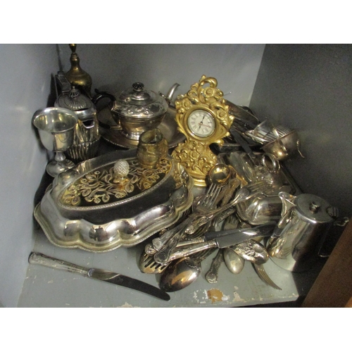 116 - A mixed lot of mainly silver plated items to include a pair of candlesticks, tureen, cutlery and oth... 