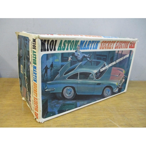 A boxed M101 Aston-Martin Secret Ejector car Location: STAIRS