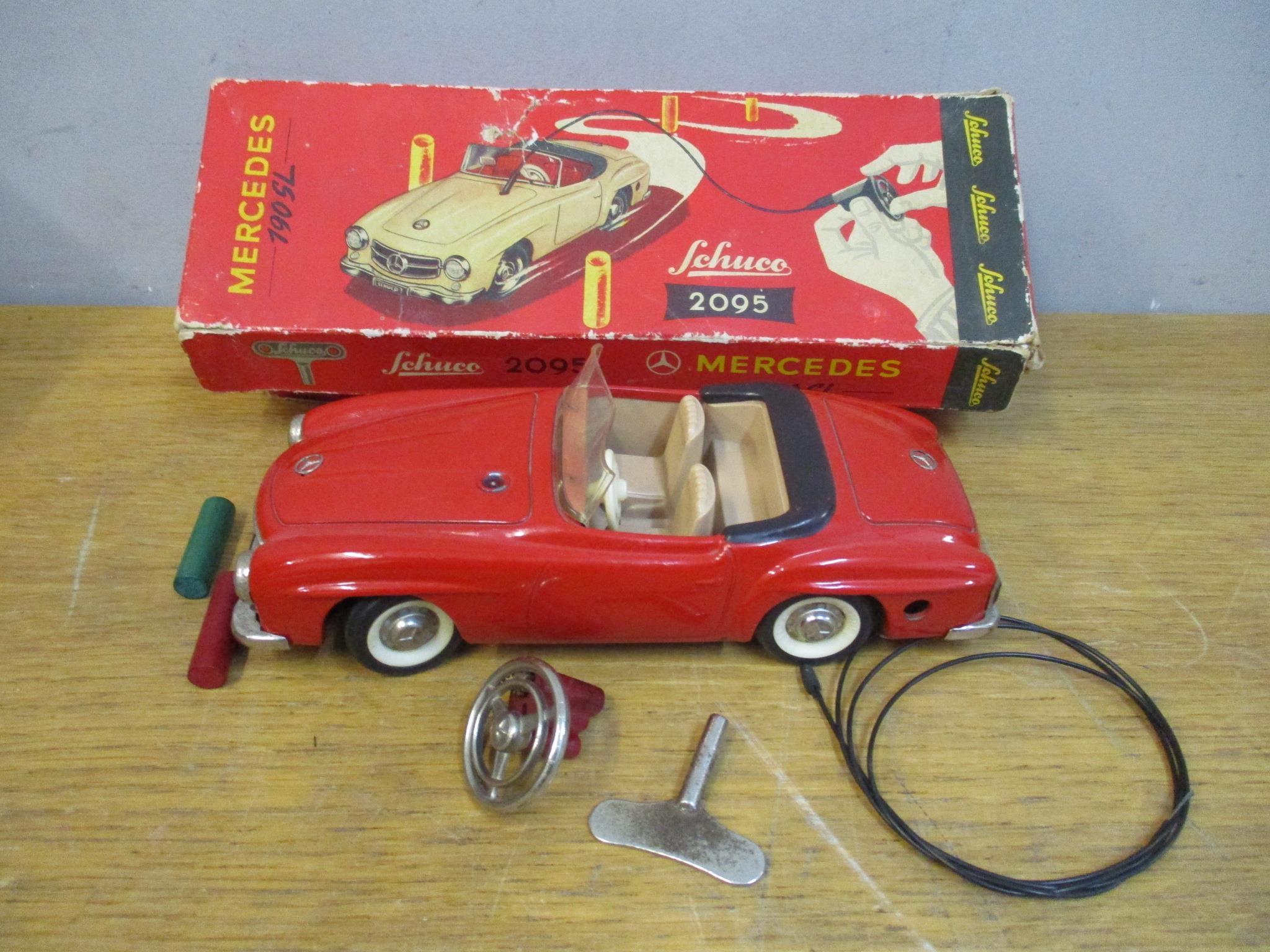 A boxed Schuco Mercedes 190SL 2095 clockwork remote control car