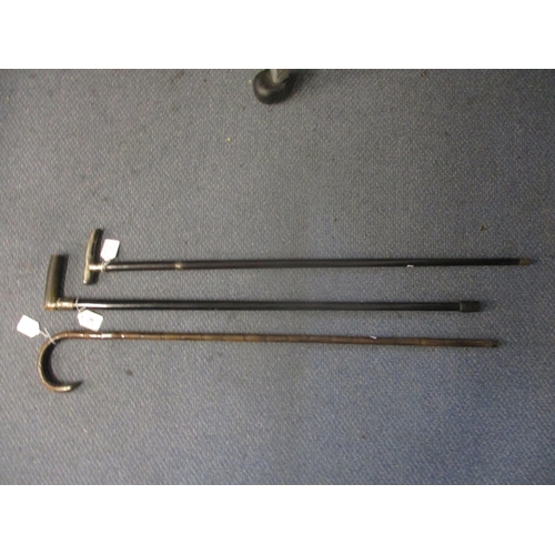 64 - Three 19th walking canes with silver mounts to include a Chinese silver handled stick with engraved ... 
