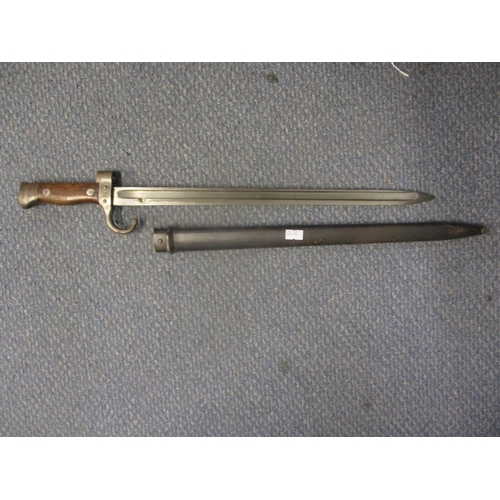 99 - A French model 1892 bayonet fullered blade stamped JC to base quillon No 17549 with metal scabbard b... 