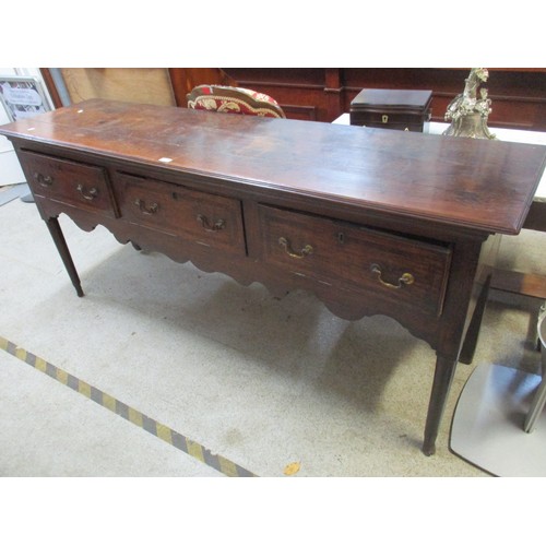 117 - A mid 18th century oak sideboard having three drawers above carved shaped frieze 87cm h x 196cm w
Lo... 