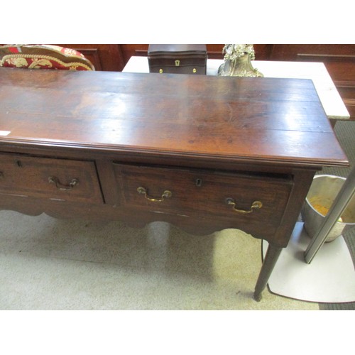 117 - A mid 18th century oak sideboard having three drawers above carved shaped frieze 87cm h x 196cm w
Lo... 