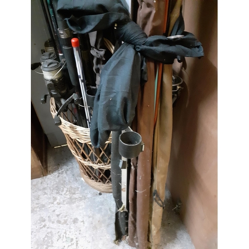 305 - A collection of mixed fishing rods and reels
Location: A1B