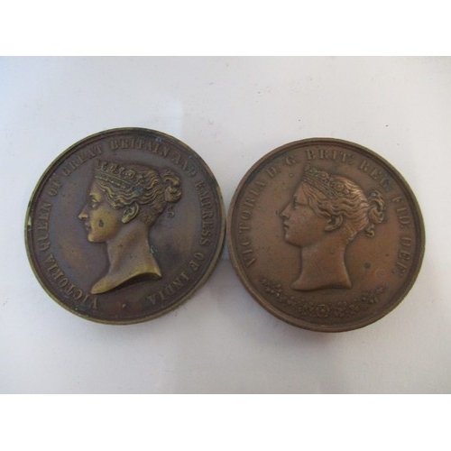67 - Two Victorian India bronze medals to include a Jubbulpore Exhibition 1866 bronze medal obverse showi... 