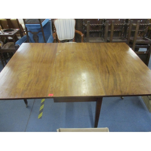 404 - A Georgian mahogany drop flap D-end dining table on square tapering legs, brass cup and castors 73cm... 