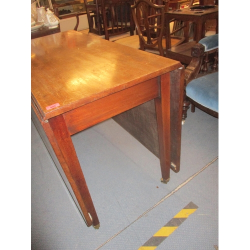 404 - A Georgian mahogany drop flap D-end dining table on square tapering legs, brass cup and castors 73cm... 