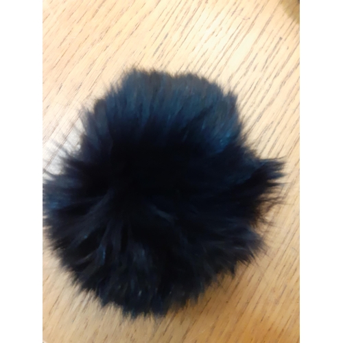 39 - An Alan Fischelis black shearling and rabbit hair three-quarter length coat, UK size 10/12 having an... 