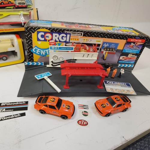 Boxed Corgi items to include two Corgi Centre sets, an MOT Boxed Corgi items to include two Corgi Centre sets, an MOT