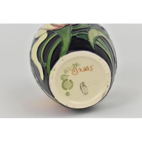 165 - A Moorcroft ceramic vase by Emma Bossons in the 'Miss Alice' pattern, 2005, with signatures and mark... 