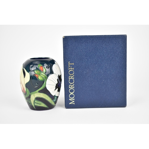 165 - A Moorcroft ceramic vase by Emma Bossons in the 'Miss Alice' pattern, 2005, with signatures and mark... 