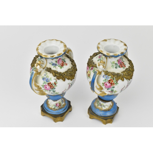 180 - A small pair of French 19th century gilt metal mounted Sevres porcelain vases, of baluster form with... 