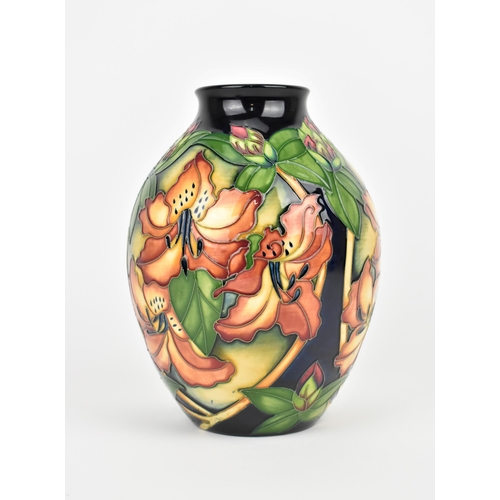127 - A Moorcroft ceramic vase in the Amberslade pattern from the New Forest collection designed by Rachel... 