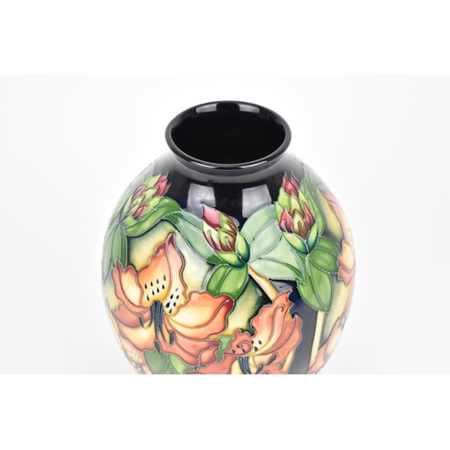 127 - A Moorcroft ceramic vase in the Amberslade pattern from the New Forest collection designed by Rachel... 