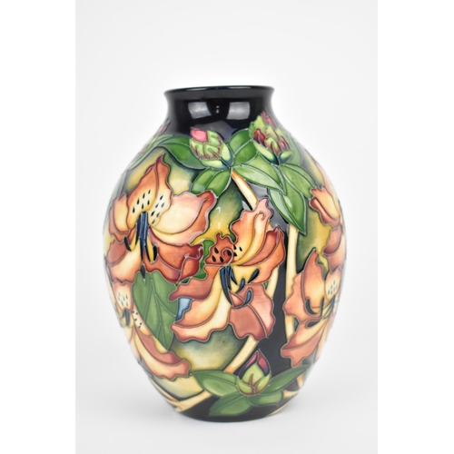 127 - A Moorcroft ceramic vase in the Amberslade pattern from the New Forest collection designed by Rachel... 