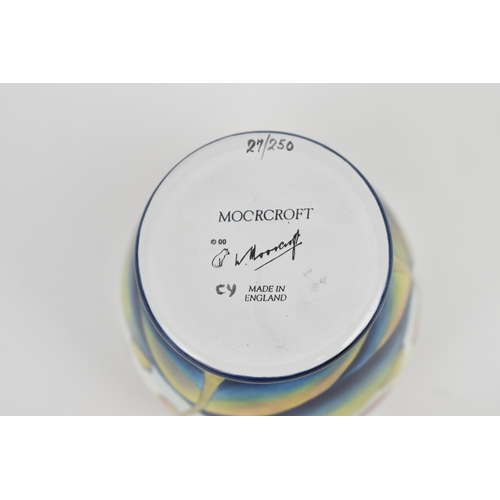 128 - A limited edition Moorcroft Enamels Ltd miniature baluster vase in the 'Hazledene Sunset' pattern by... 