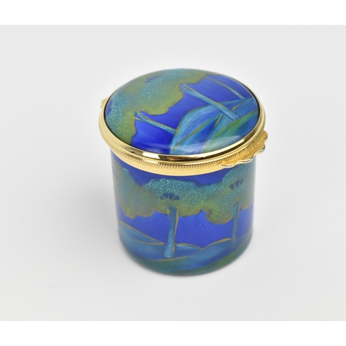 130 - A Moorcroft Enamels Ltd miniature box with hinged lid, decorated in the ‘Moonlit Blue’ pattern, in o... 
