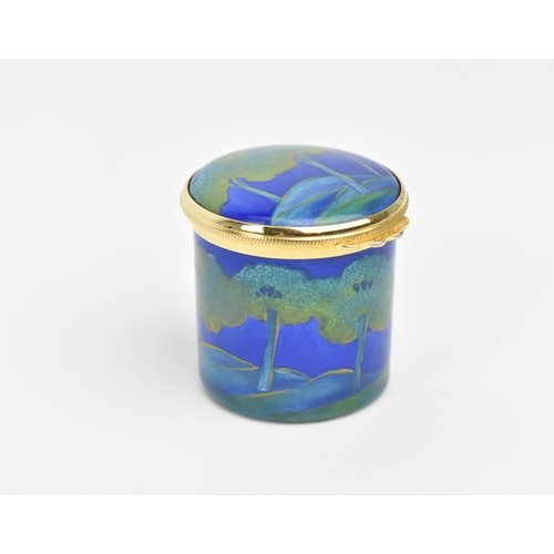 130 - A Moorcroft Enamels Ltd miniature box with hinged lid, decorated in the ‘Moonlit Blue’ pattern, in o... 