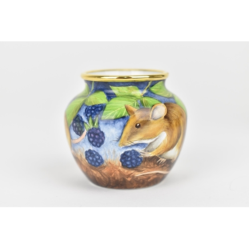 133 - A Moorcroft Enamels Ltd miniature vase, of squat form designed with dormice eating blackberries, art... 