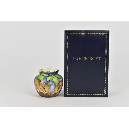 133 - A Moorcroft Enamels Ltd miniature vase, of squat form designed with dormice eating blackberries, art... 