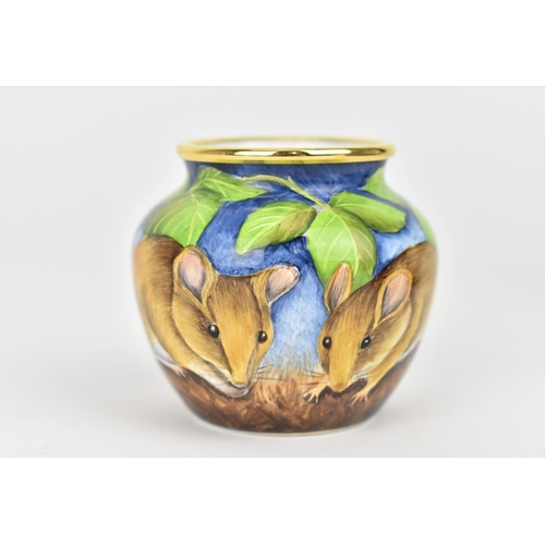 133 - A Moorcroft Enamels Ltd miniature vase, of squat form designed with dormice eating blackberries, art... 