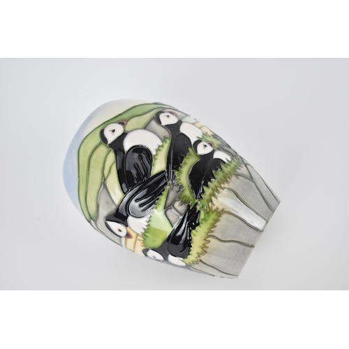 141 - A Moorcroft ceramic baluster vase in the 'Puffin' pattern designed by Carol Lovett, 1997, with impre... 