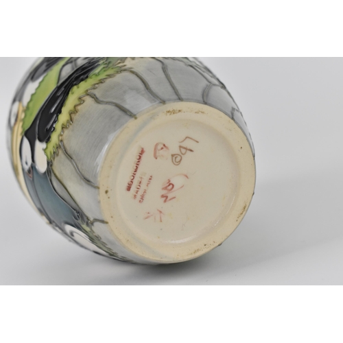 141 - A Moorcroft ceramic baluster vase in the 'Puffin' pattern designed by Carol Lovett, 1997, with impre... 