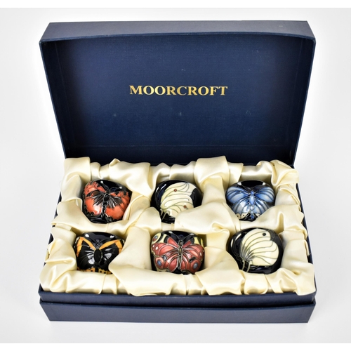 142 - A limited edition Moorcroft ceramic set of six egg cups, designed by Rachel Bishop, in a tubelined b... 