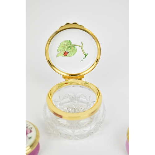 144 - A collection of Moorcroft Enamels Ltd pill boxes and a cut glass enamel lidded box, by various artis... 