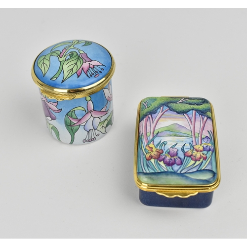 145 - Two Moorcroft Enamels Ltd hinged boxes to include one painted by E. Todd, depicting a water landscap... 
