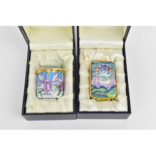 145 - Two Moorcroft Enamels Ltd hinged boxes to include one painted by E. Todd, depicting a water landscap... 
