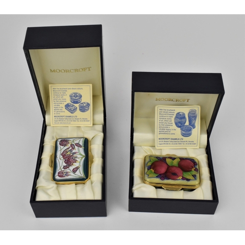 146 - Two Moorcroft Enamels Ltd pill boxes with hinged lids, one painted with snakes head fritillaries, ar... 