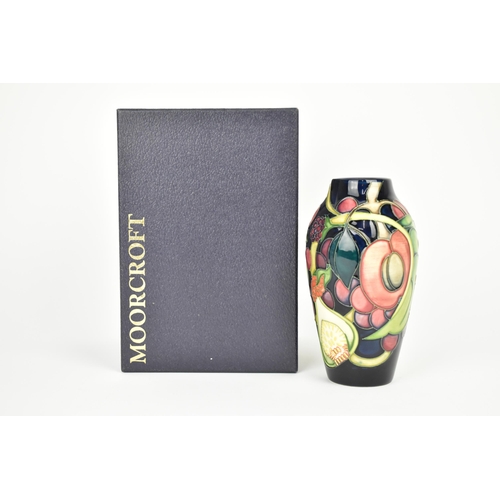 149 - A Moorcroft pottery Queens Choice pattern vase by Emma Bossons, decorated with tubelined fruit and f... 