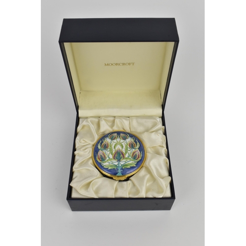 152 - A Moorcroft Enamels Ltd box with hinged lid, in the 'Teasel' pattern, 2004, designed by Philip Gibso... 