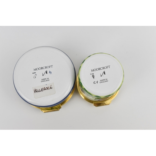 153 - Two Moorcroft Enamels Ltd boxes with hinged lids, both with floral design, the larger one in the 'he... 