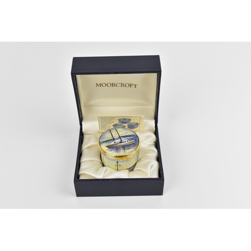 154 - A Moorcroft Enamels Ltd box with hinged lid, the nautical pattern with boats in a harbour, designer'... 