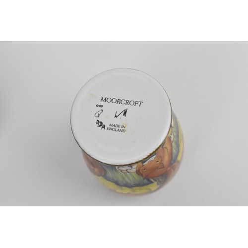 155 - A Moorcroft Enamels Ltd miniature baluster vase, painted with squirrels foraging, with artists initi... 