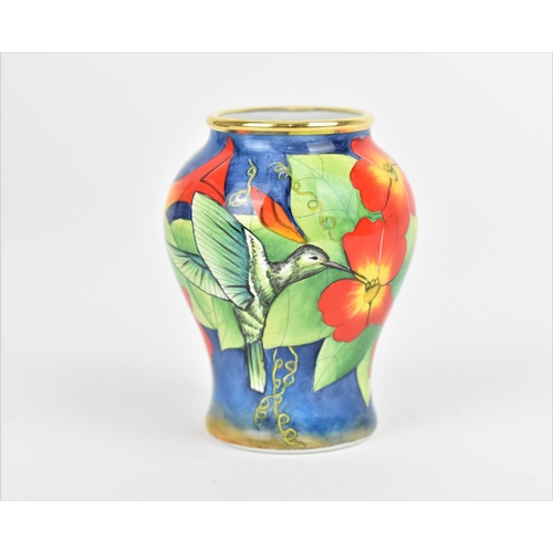 158 - A Moorcroft Enamels Ltd miniature baluster vase, painted by Faye Williams with hummingbirds drinking... 