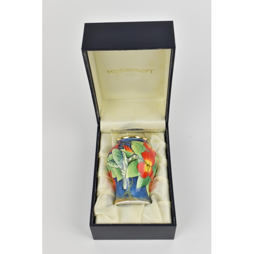 158 - A Moorcroft Enamels Ltd miniature baluster vase, painted by Faye Williams with hummingbirds drinking... 