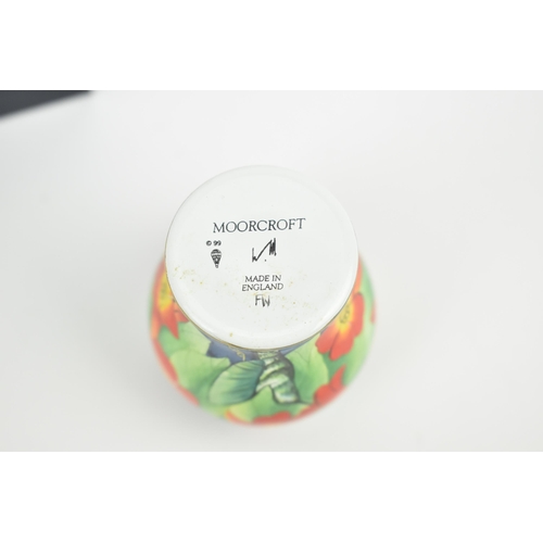 158 - A Moorcroft Enamels Ltd miniature baluster vase, painted by Faye Williams with hummingbirds drinking... 