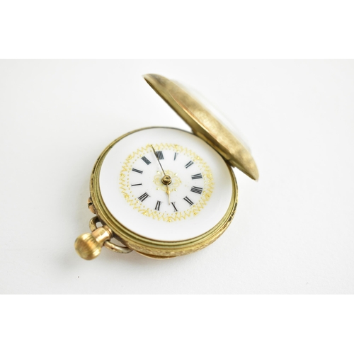 69 - A late 19th/early 20th century ladies manual wind 14k cased fob pocket watch, having a white enamel ... 