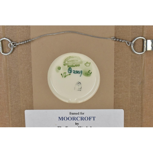 151 - Two Moorcroft decorative plaques, to include one with 