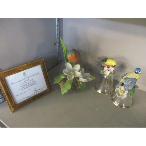 188 - A Royal Worcester limited edition model of a Robin, modelled by James Alder No.4/250 with leather fr... 