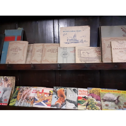 200 - A large quantity of early 20th century cigarette cards and 1970's tea collectors cards together with... 